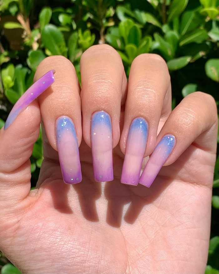 Accessorizing Purple Ombre Nails With Glitter