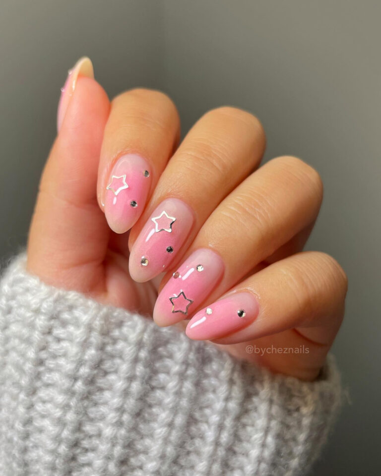 Chic Pink Nail Art With Glitter And Heart Accents